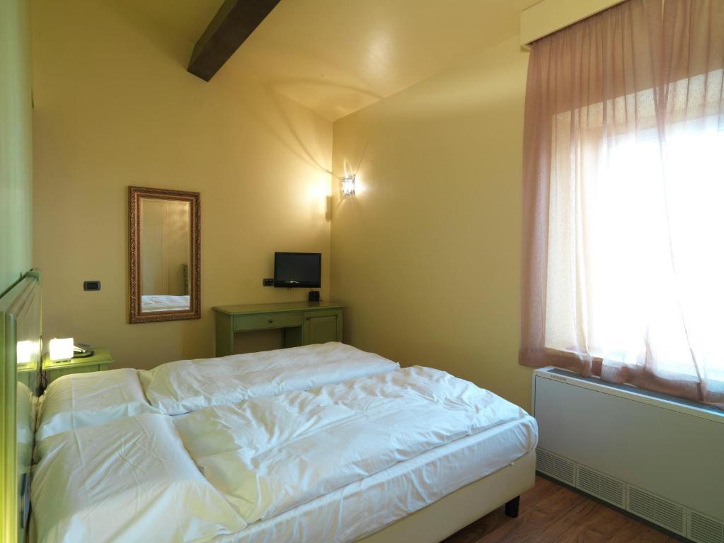 Empoli Hotel Pokoj fotografie